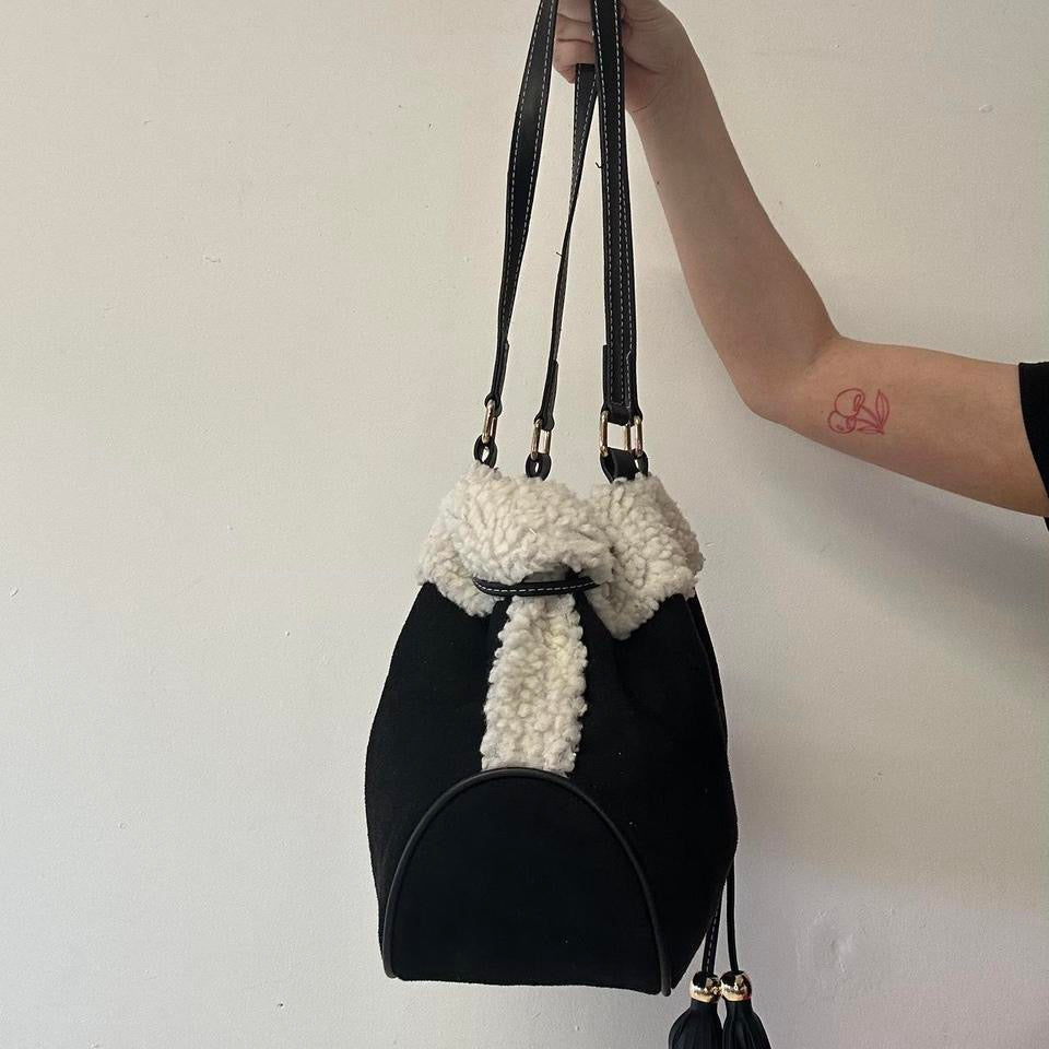 black faux fur drawstring shoulder bag