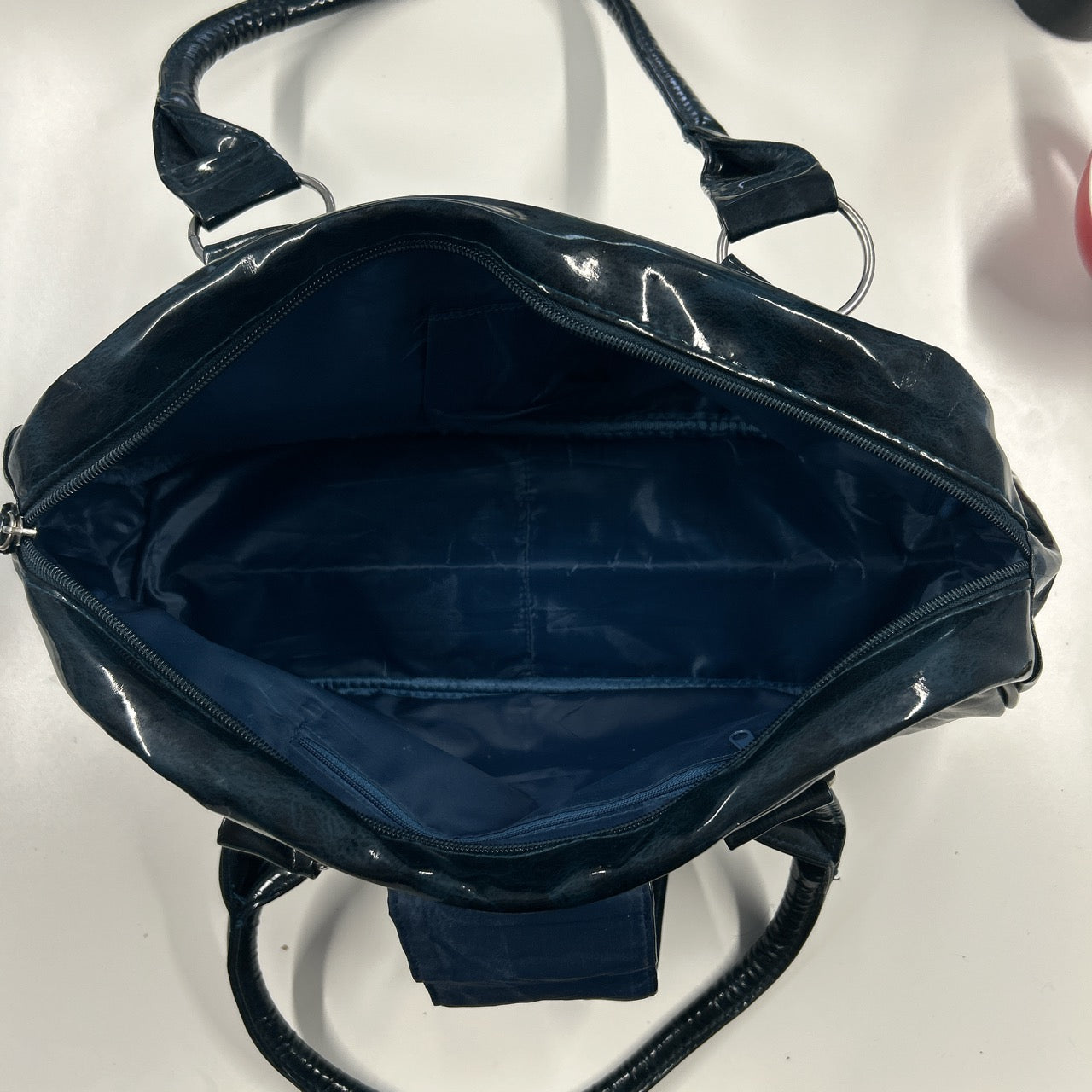 navy patent bowler shoulder bag