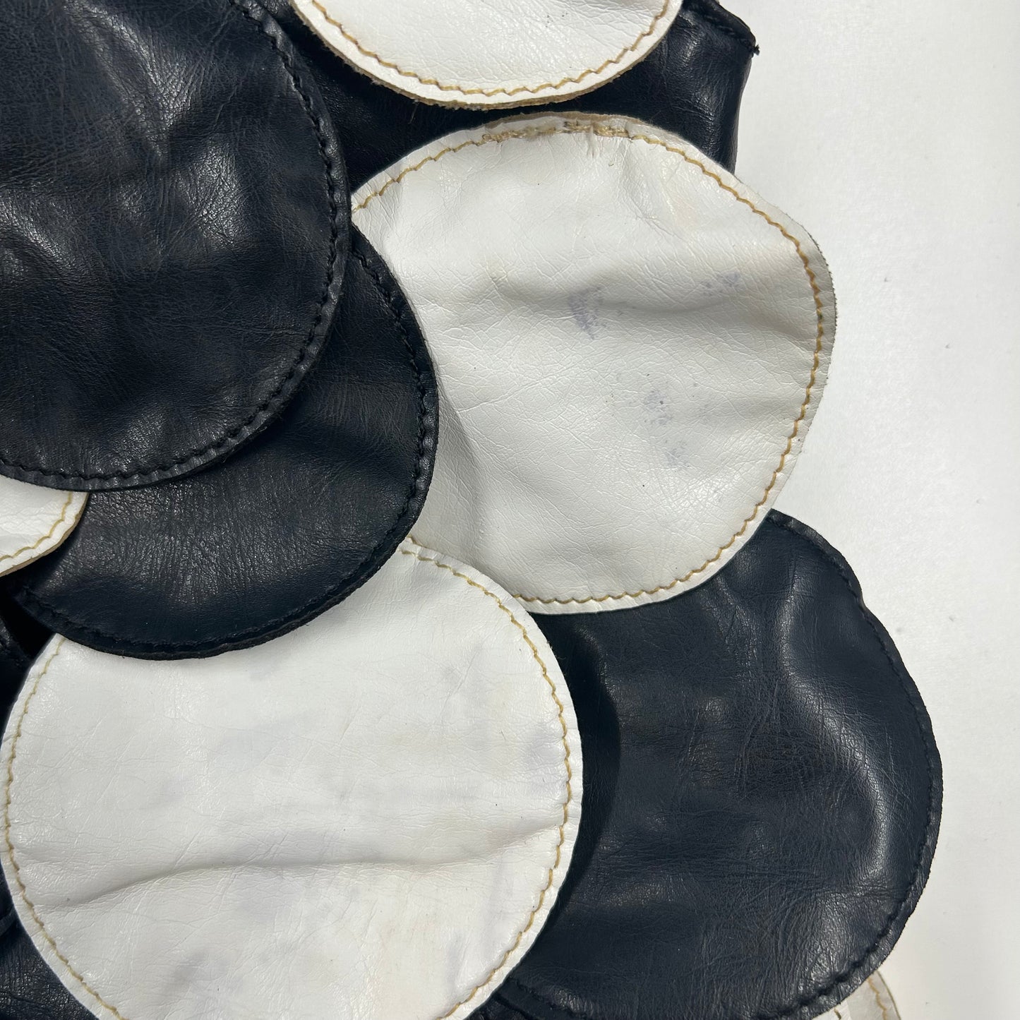 black and white faux leather disc beaded shoulder bag