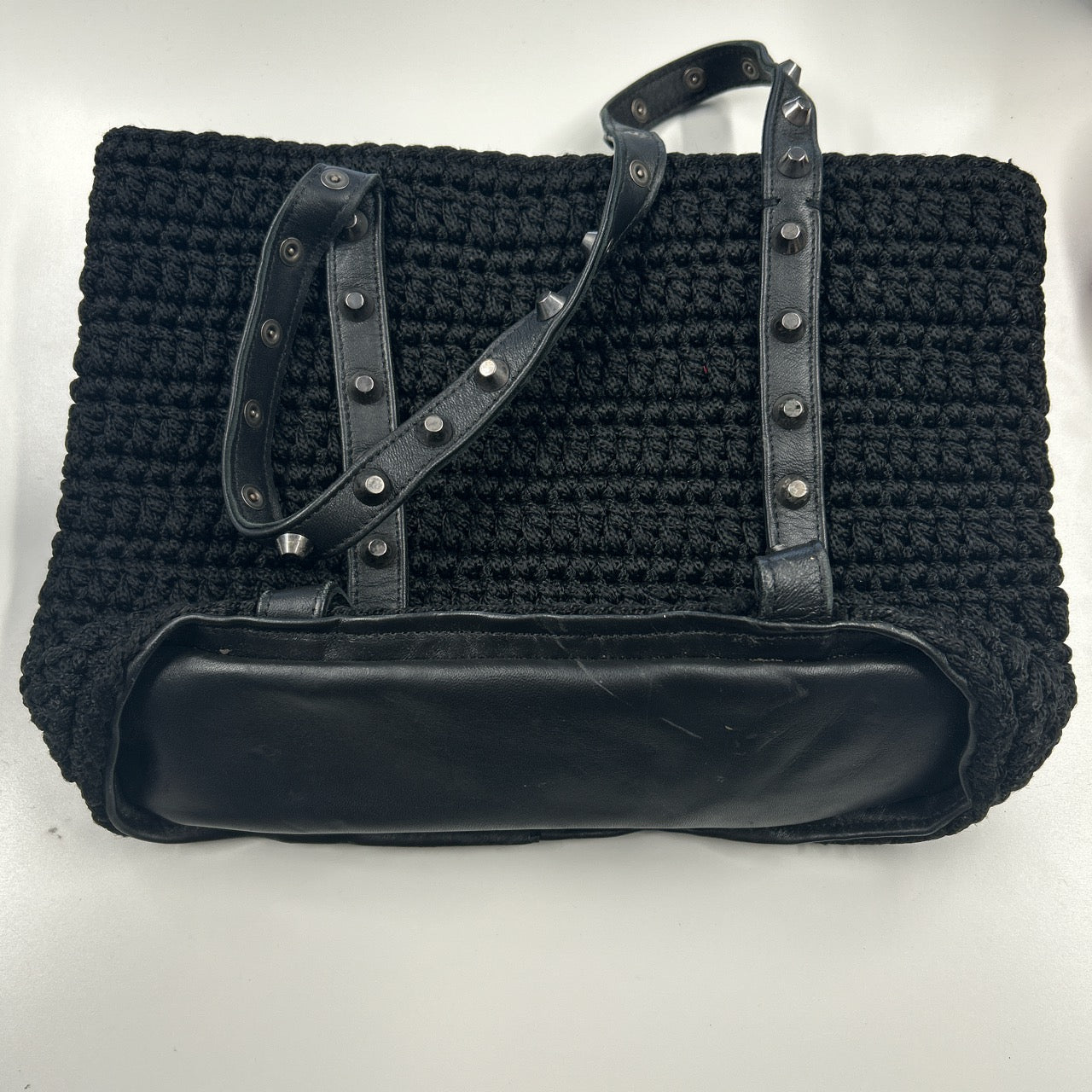 black woven studded shoulder bag
