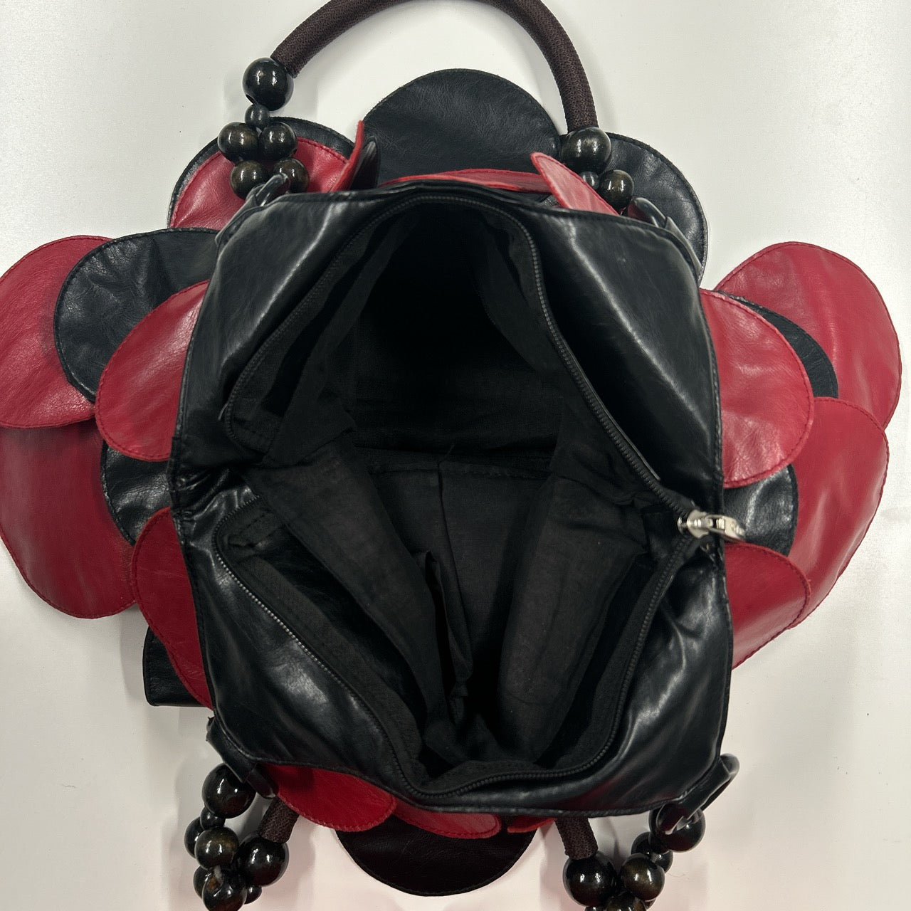 red and black faux leather disc beaded shoulder bag
