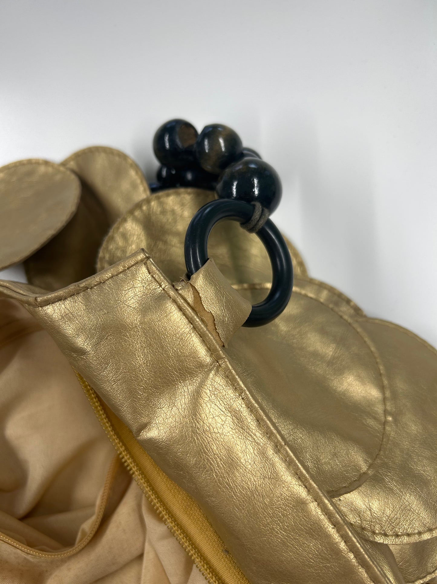 gold faux leather disc beaded shoulder bag