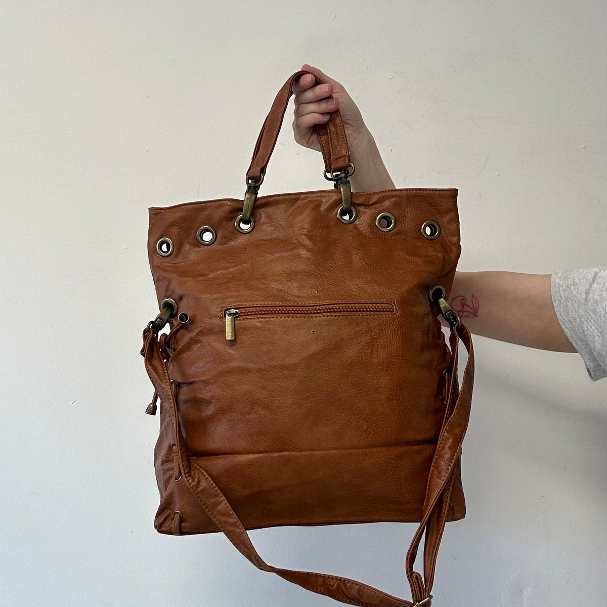 brown eyelet ruched faux leather shoulder bag