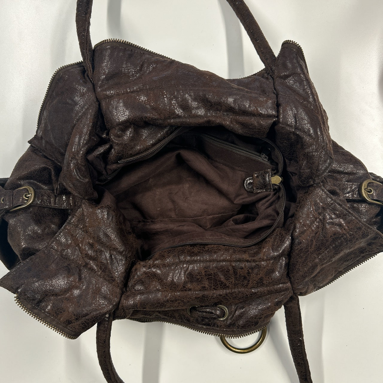 brown studded faux leather slouchy shoulder bag