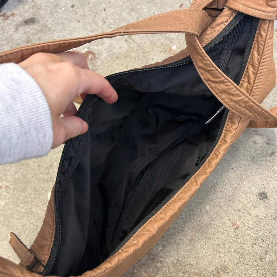 brown crescent adjustable strap shoulder bag