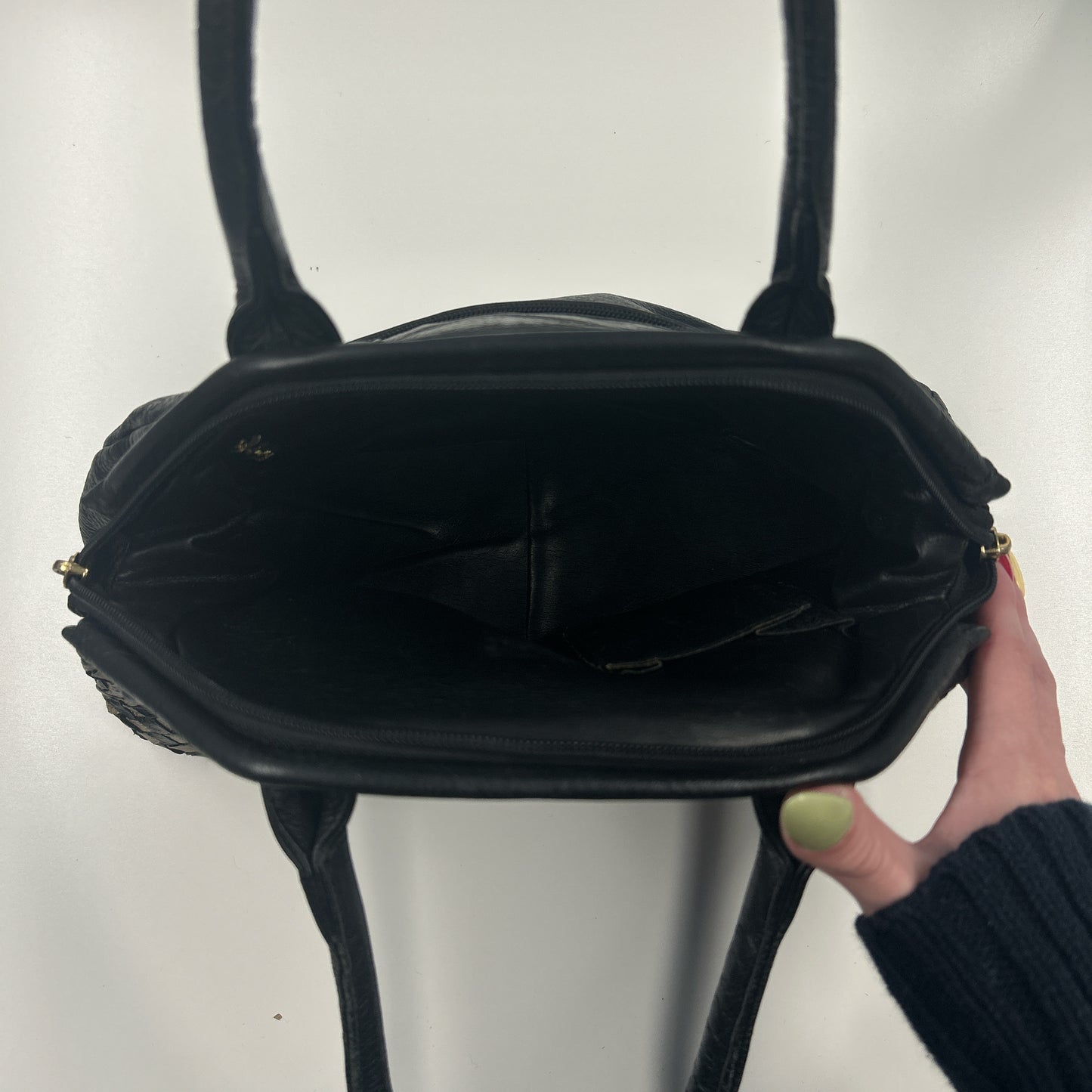 black and tanned woven leather shoulder bag