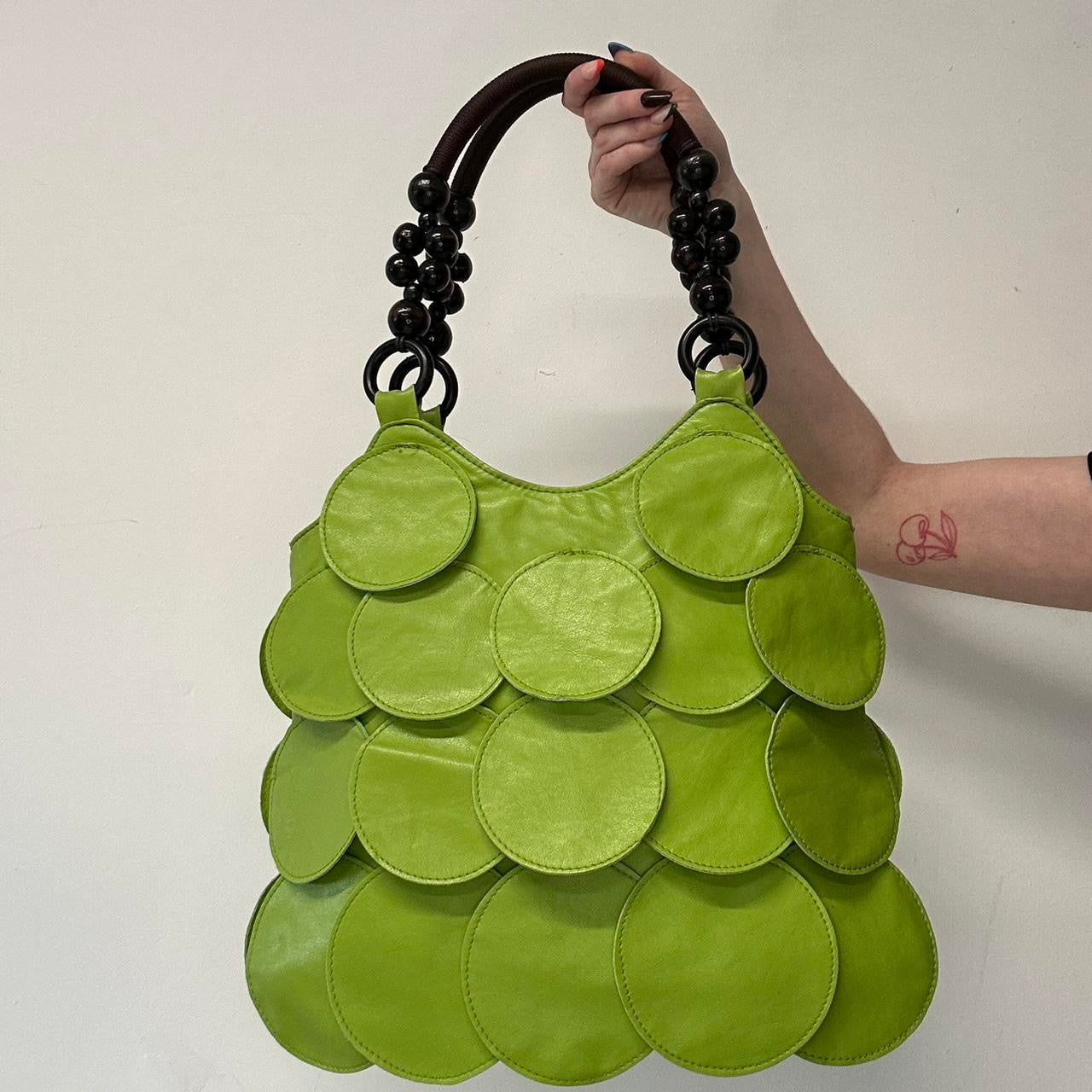 green faux leather disc layered shoulder bag