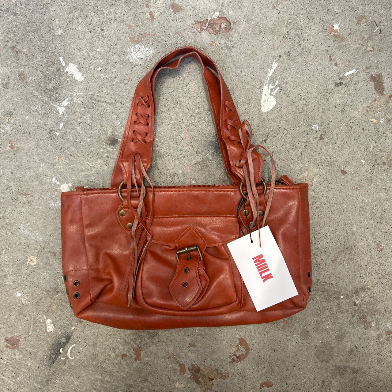burnt orange / brown leather buckle shoulder bag