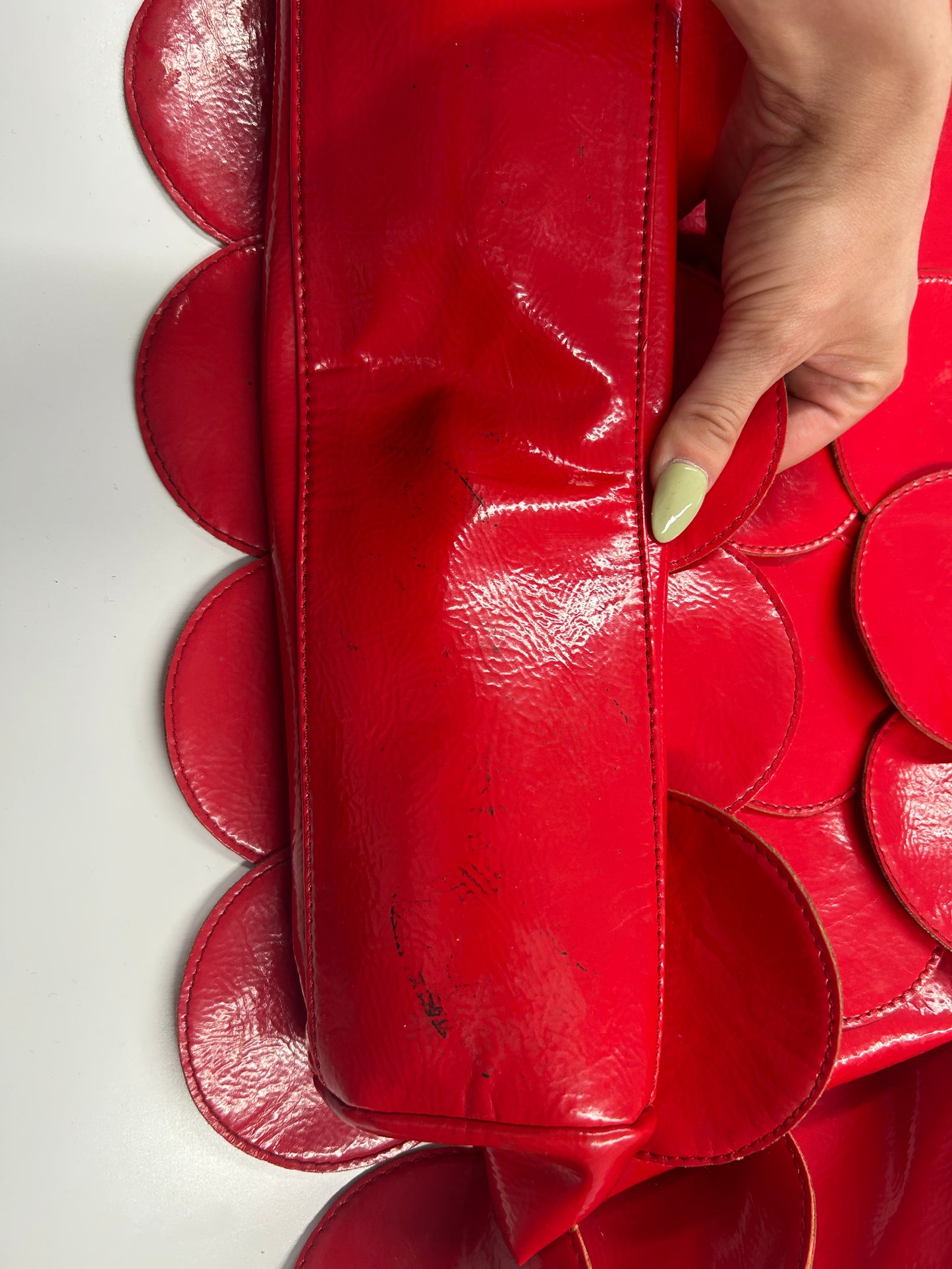 red faux leather disc beaded shoulder bag