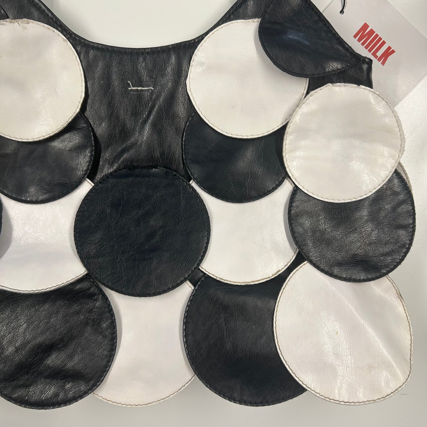 black and white faux leather disc beaded shoulder bag