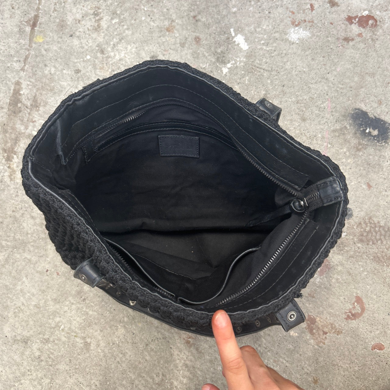 black studded genuine leather woven shoulder bag
