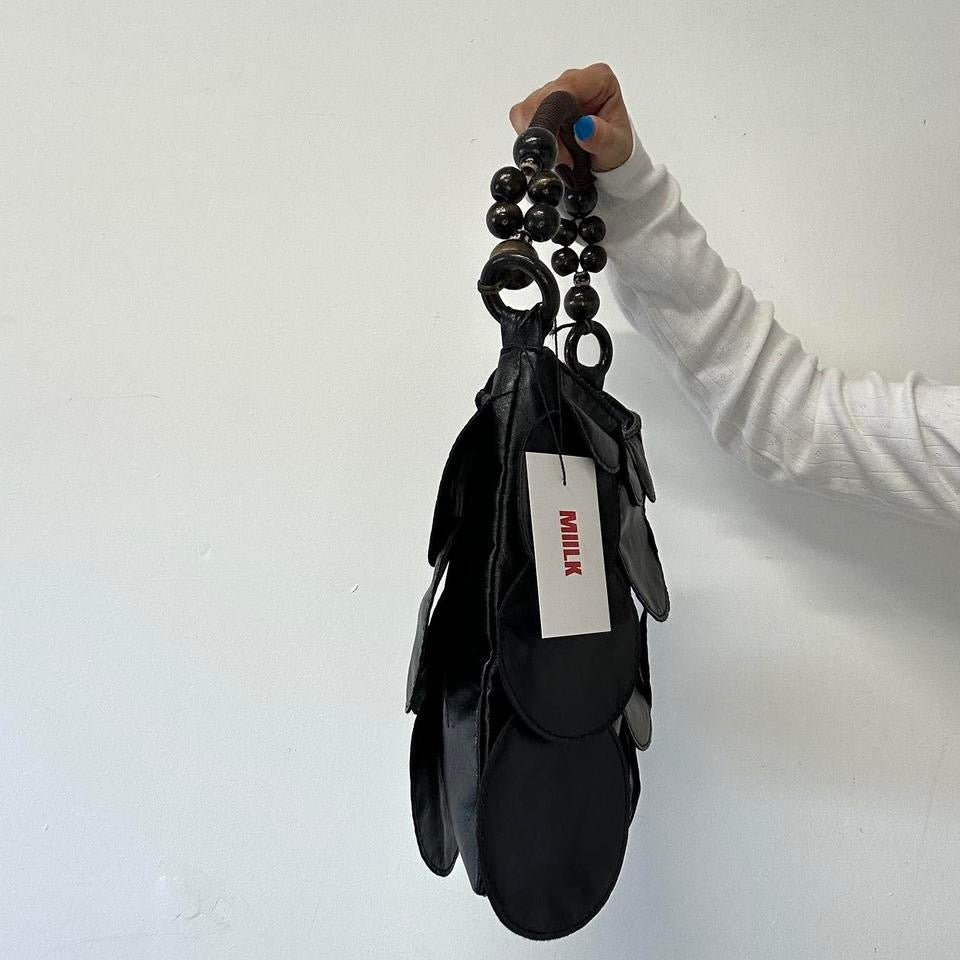 black faux leather disc beaded shoulder bag