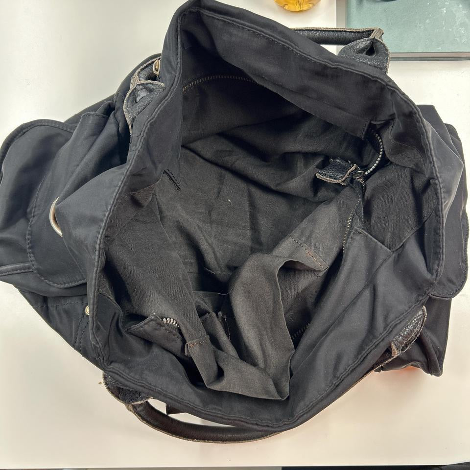black canvas buckle shoulder bag