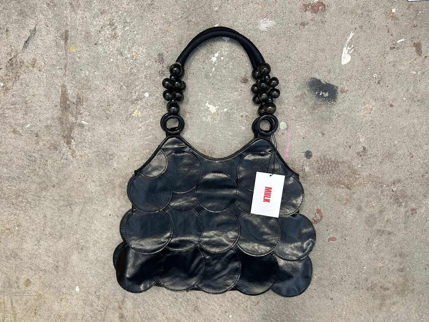black faux leather disc beaded shoulder bag