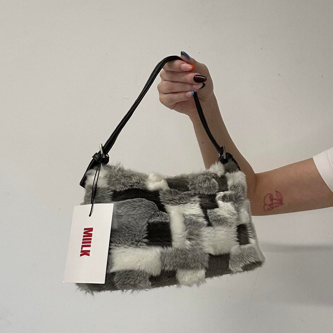 grey and white fluffy shoulder bag