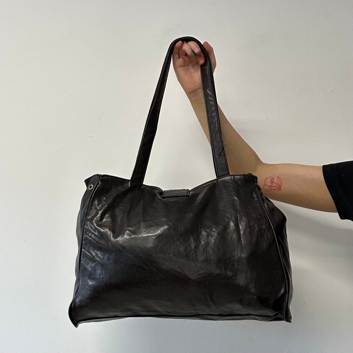 brown faux leather eyelet studded shoulder bag