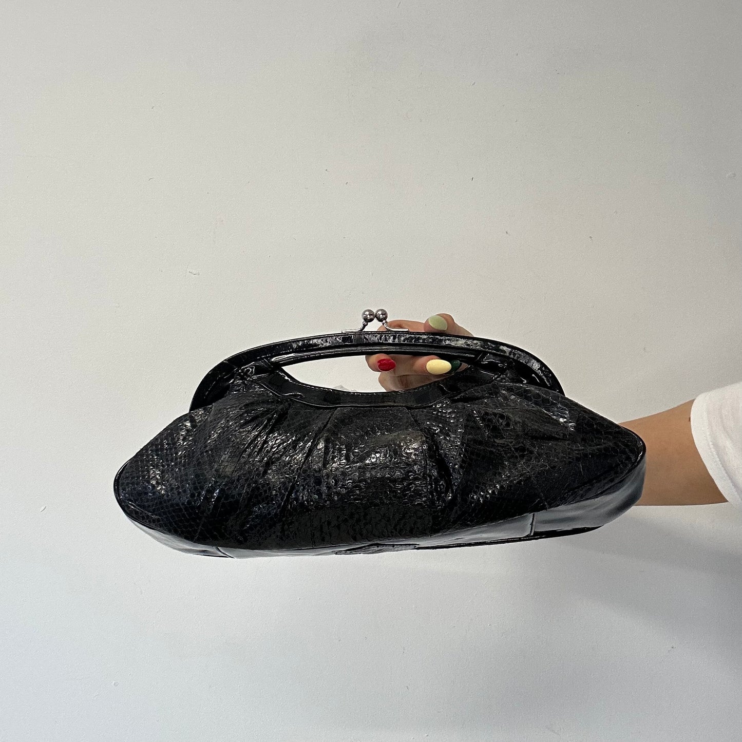black faux leather croc effect clutch bag