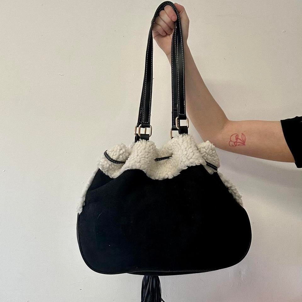 black faux fur drawstring shoulder bag