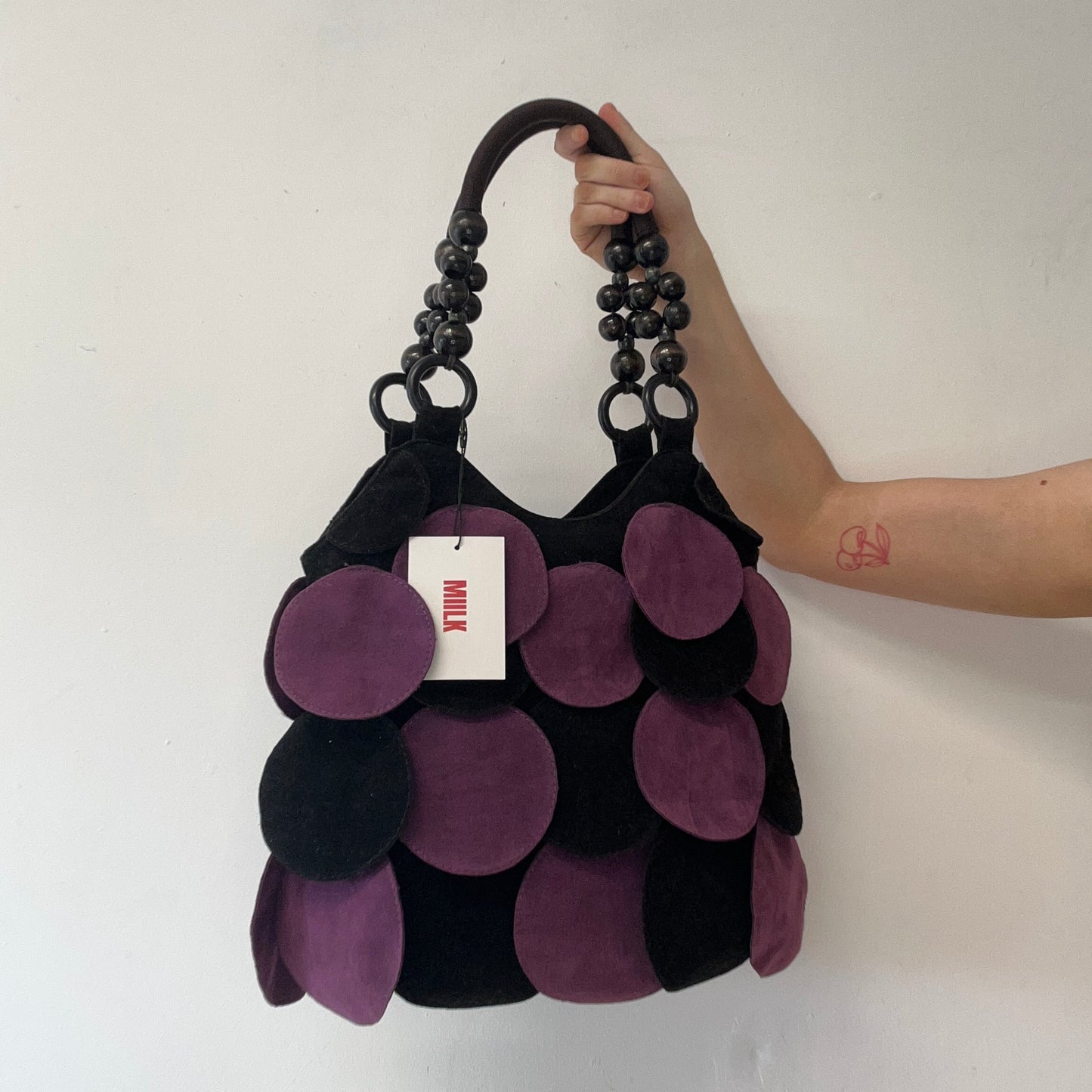 purple and black suede feel disc beaded shoulder bag