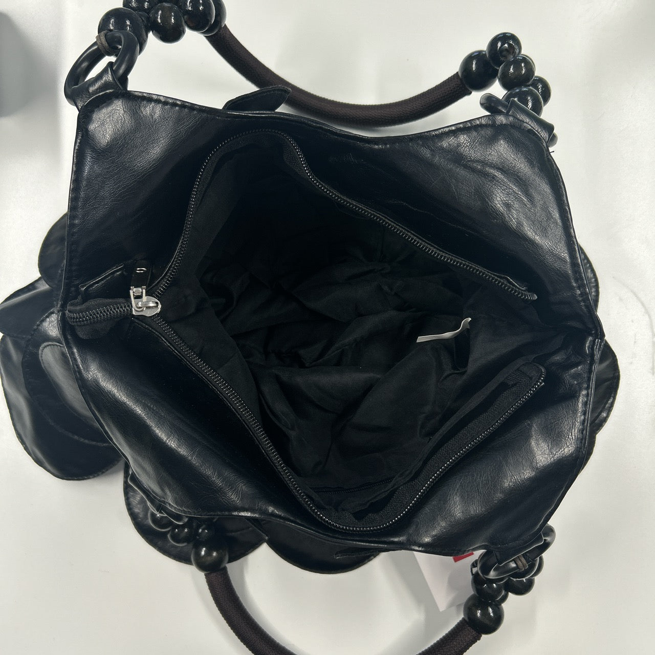black faux leather disc beaded shoulder bag