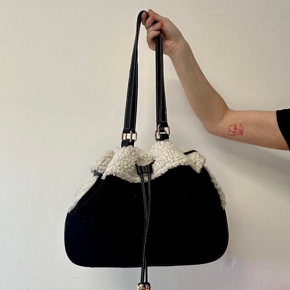 black faux fur drawstring shoulder bag