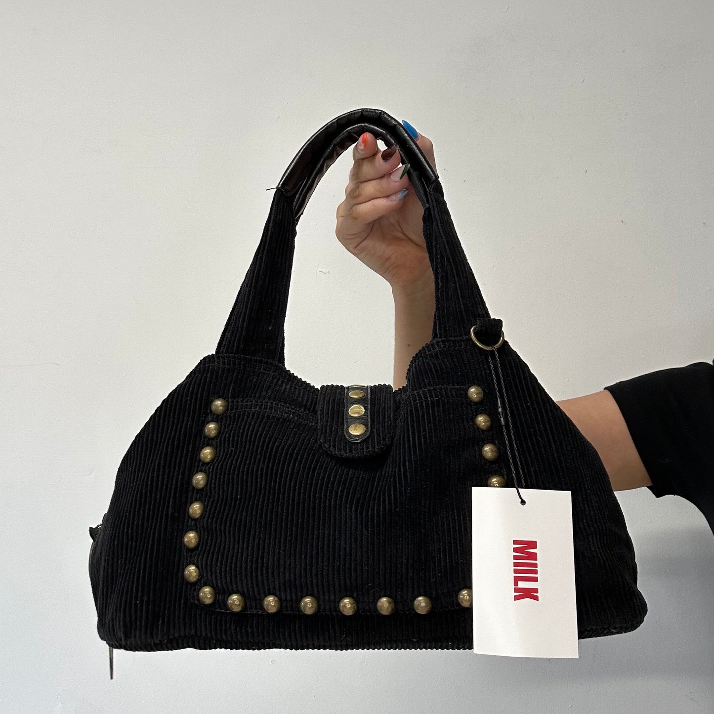 black corduroy studded shoulder bag