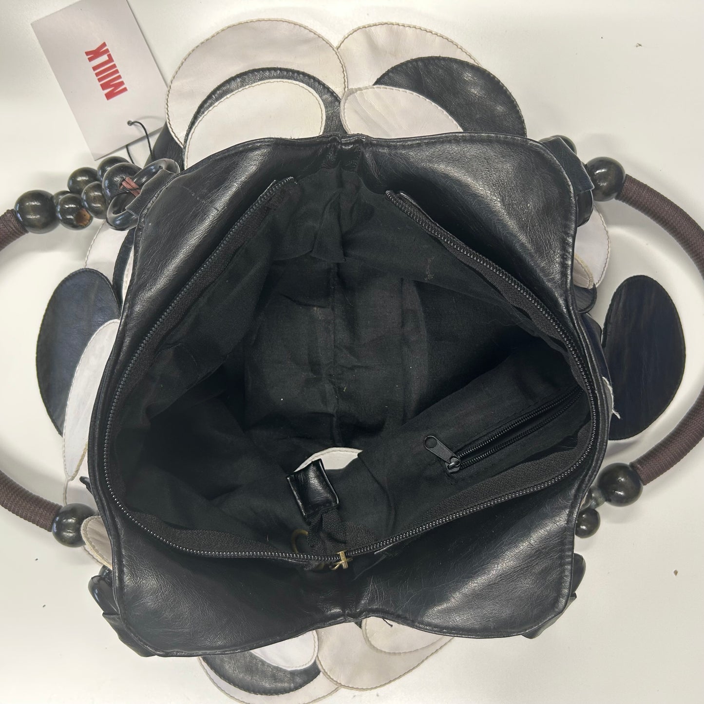 black and white faux leather disc beaded shoulder bag