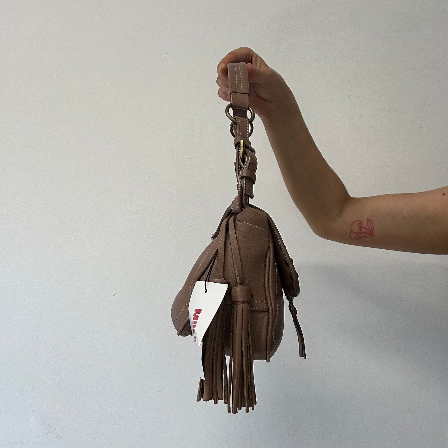 brown studded buckle shoulder bag