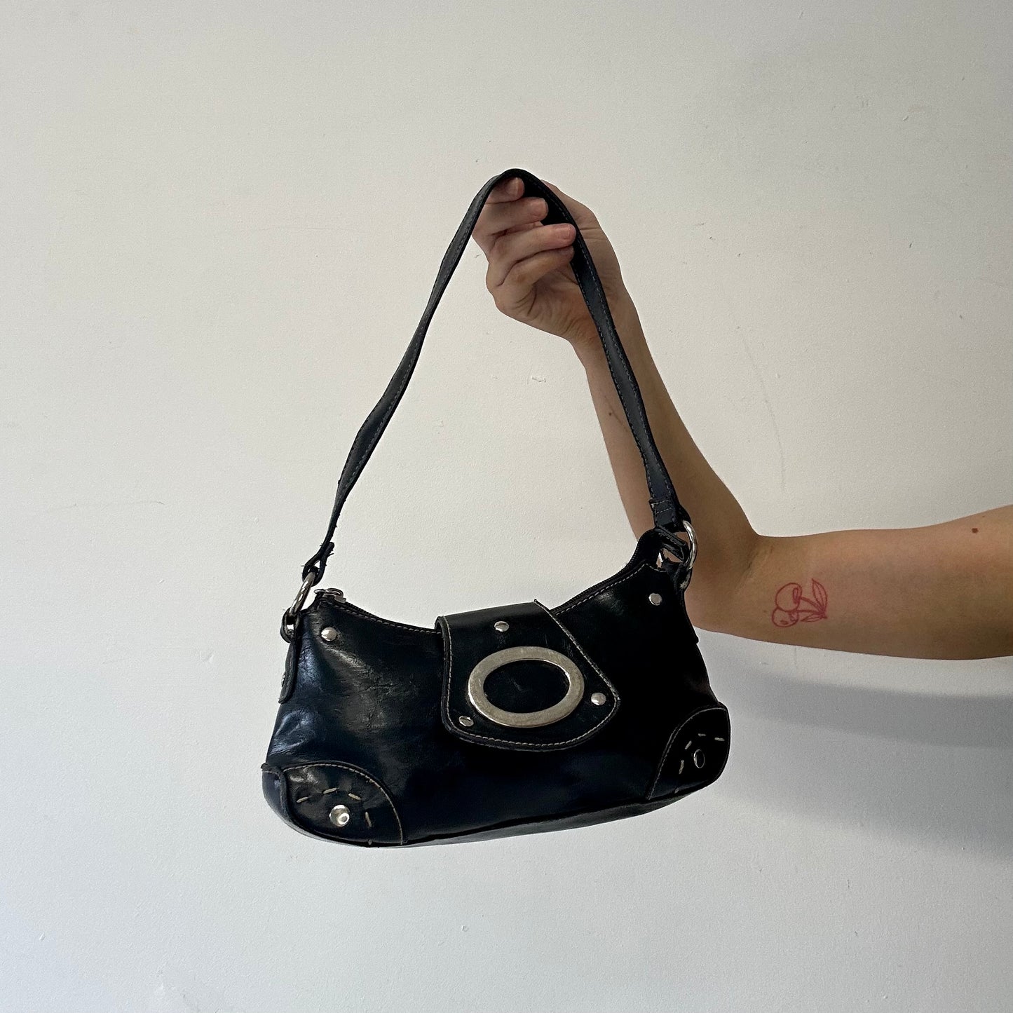 black faux leather oversized buckle shoulder bag