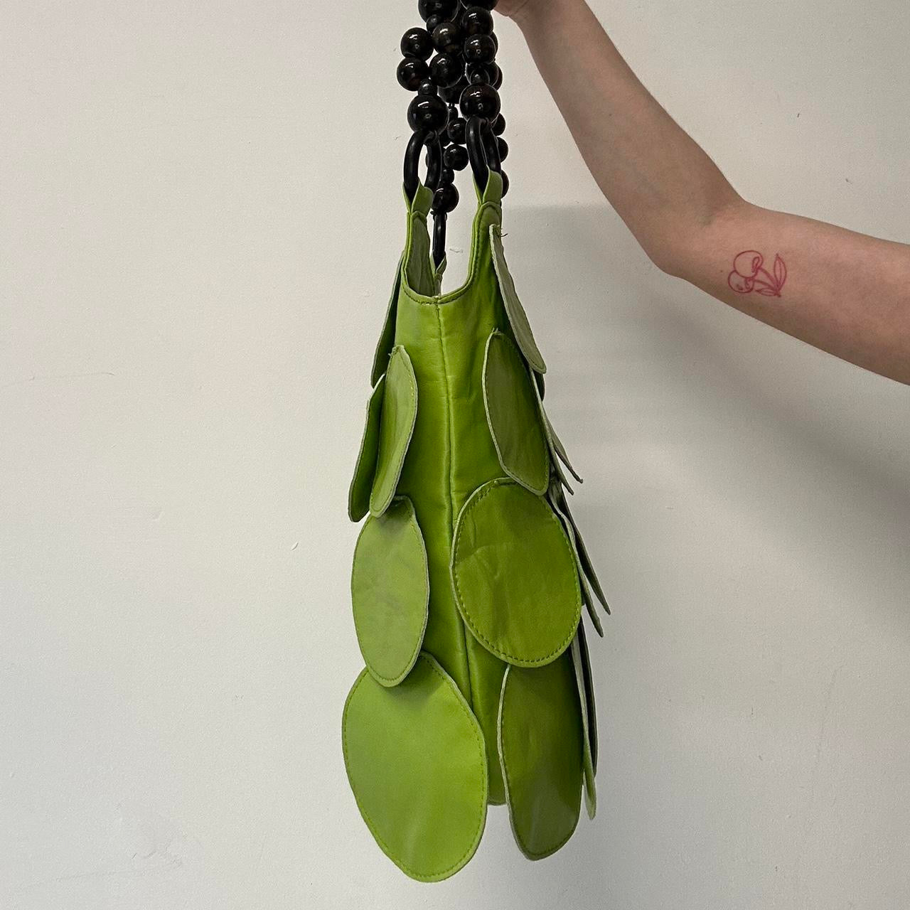 green faux leather disc layered shoulder bag