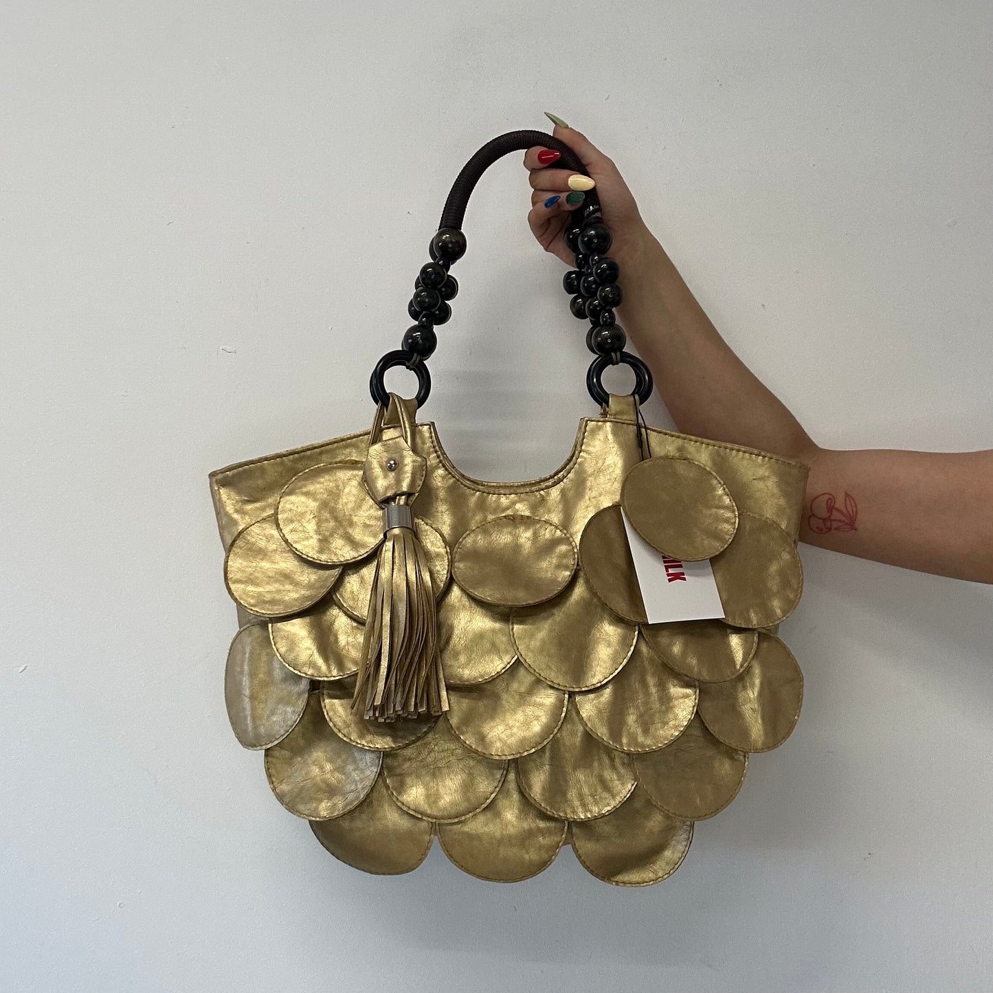 gold faux leather disc beaded shoulder bag