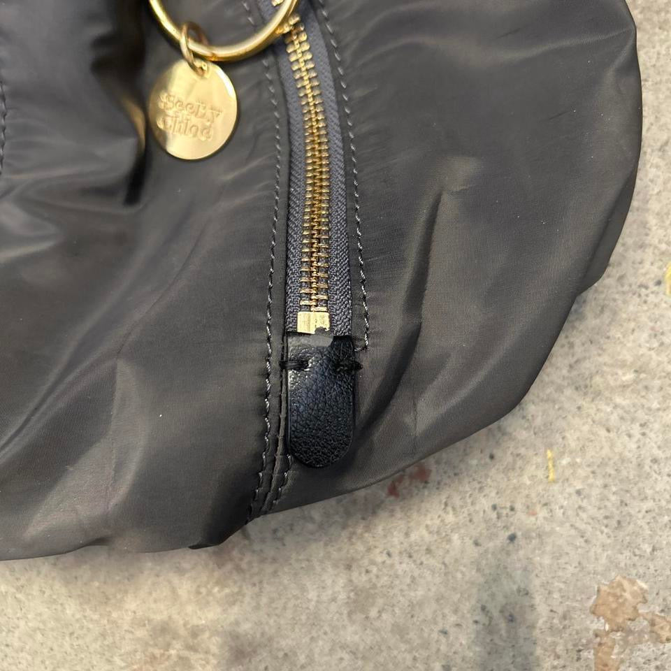 grey double zip drawstring hand bag