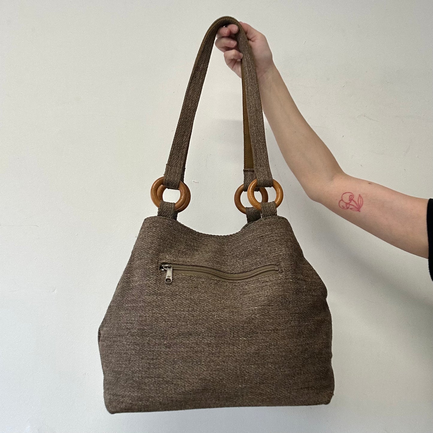 brown woven shoulder bag