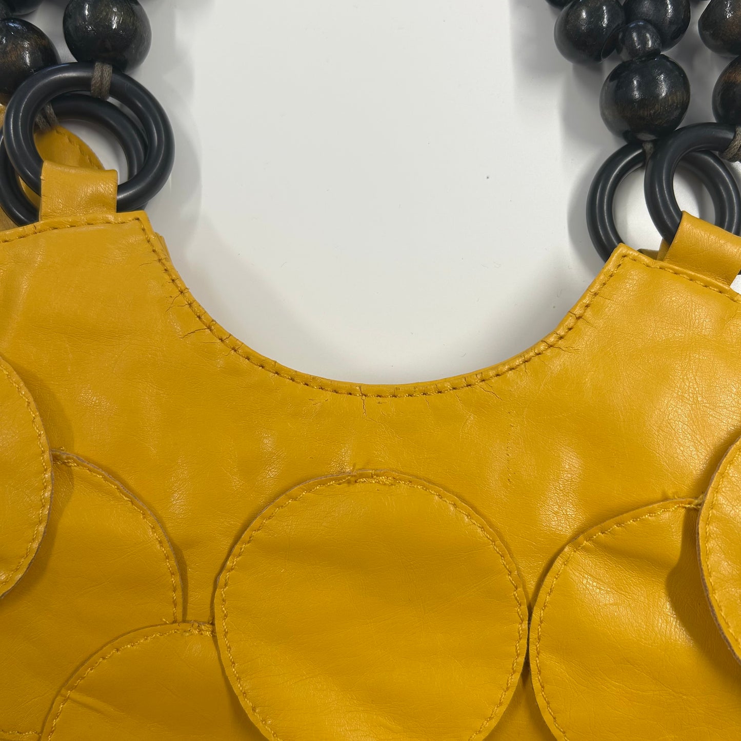 yellow faux leather disc beaded shoulder bag