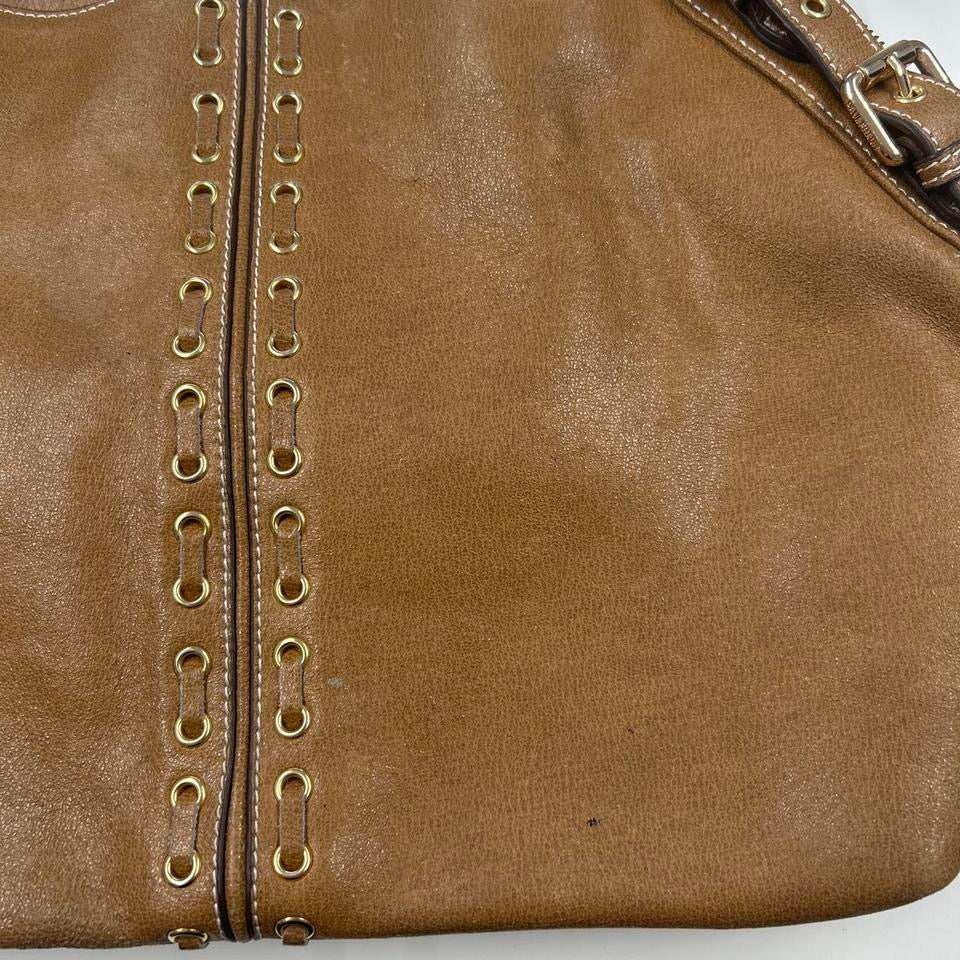 brown faux leather eyelet shoulder bag