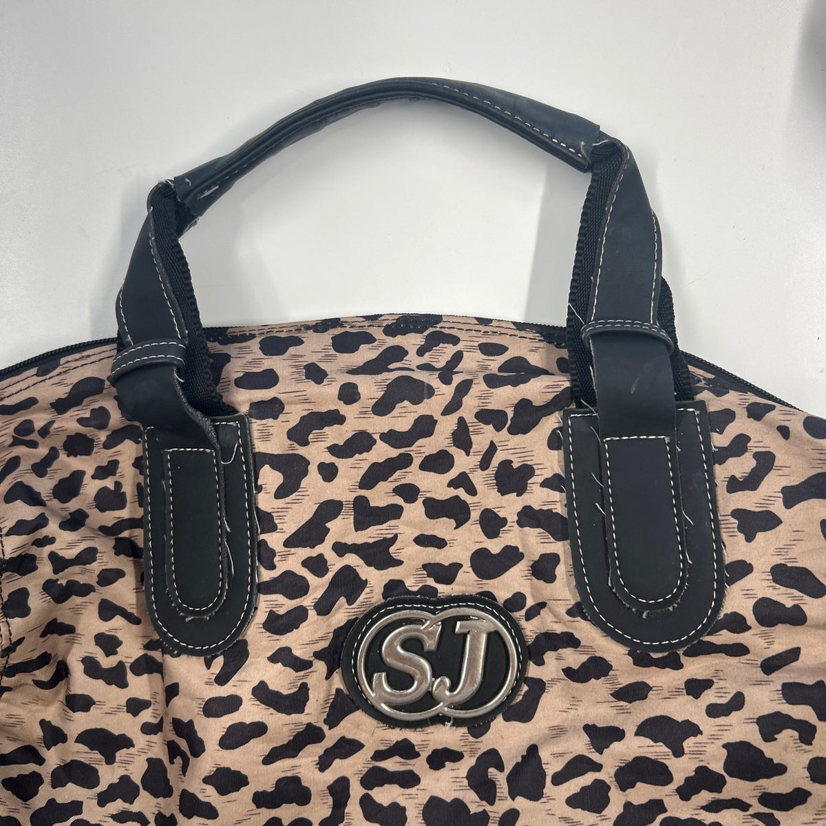 brown patterned faux leather shoulder bag