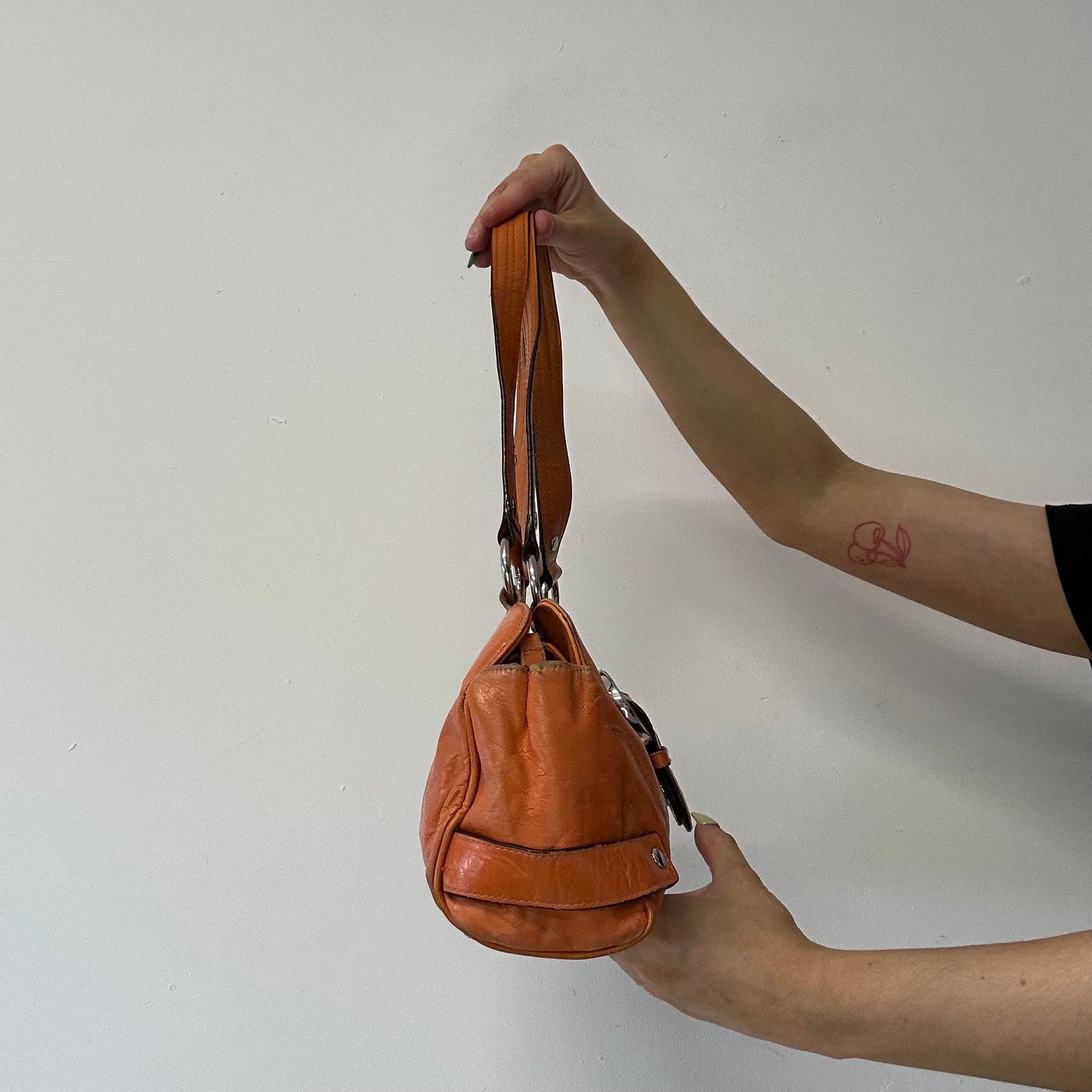 orange faux leather buckle shoulder bag