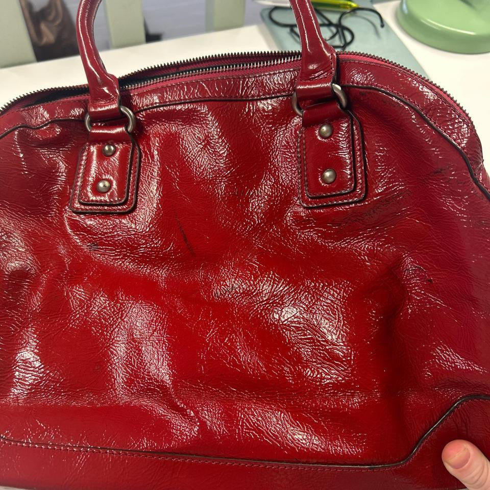 red faux leather padlock buckle shoulder bag