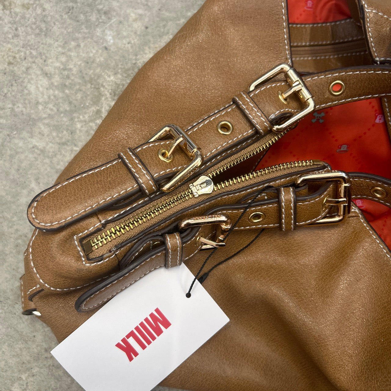 brown eyelet faux leather shoulder bag