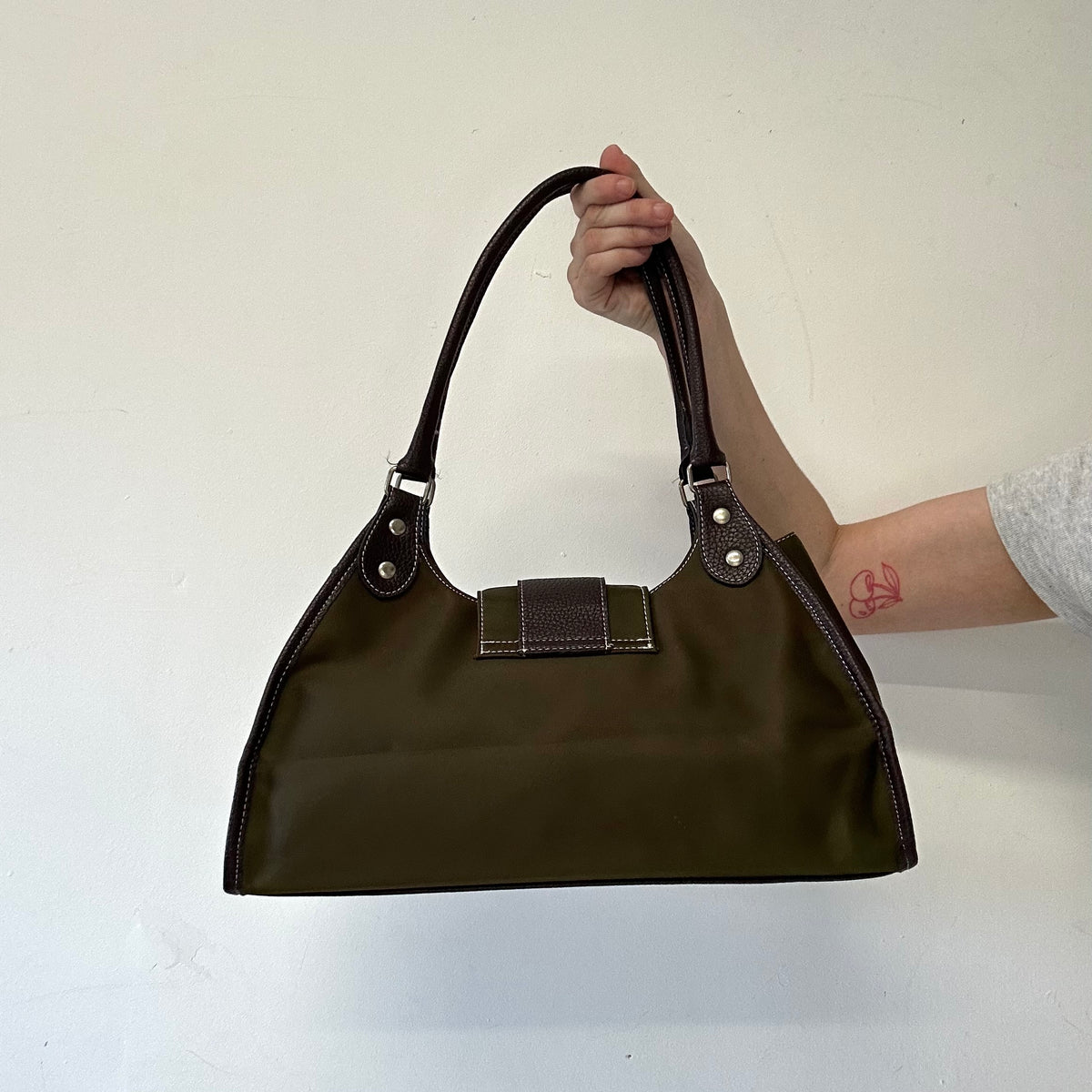 khaki canvas and brown faux leather buckle shoulder bag