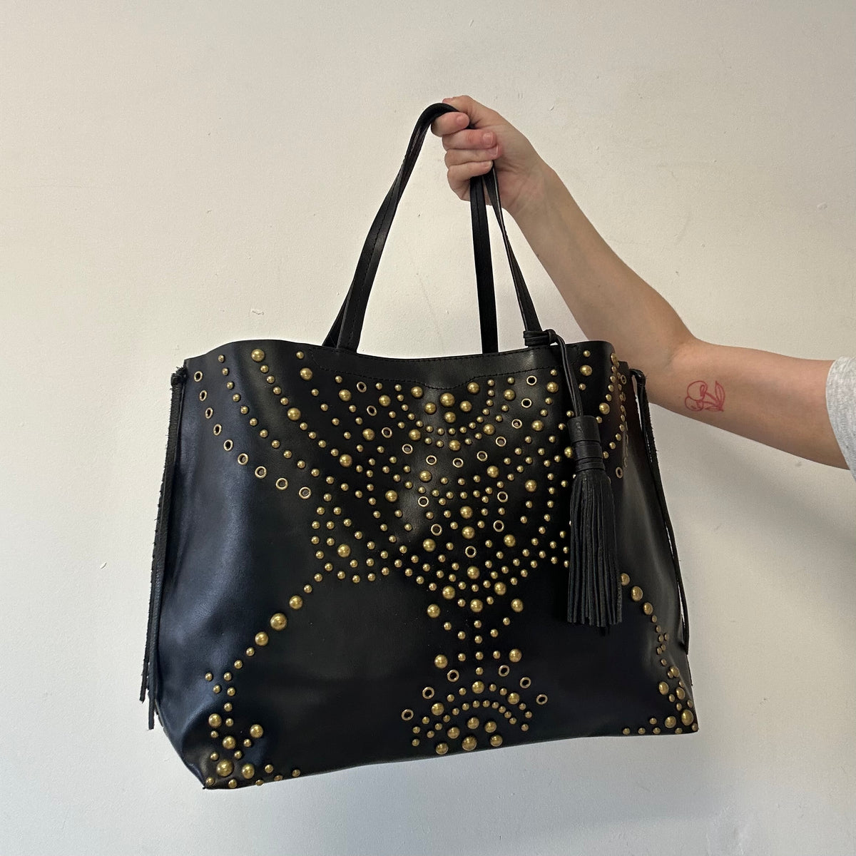 black studded eyelet large faux leather shoulder bag