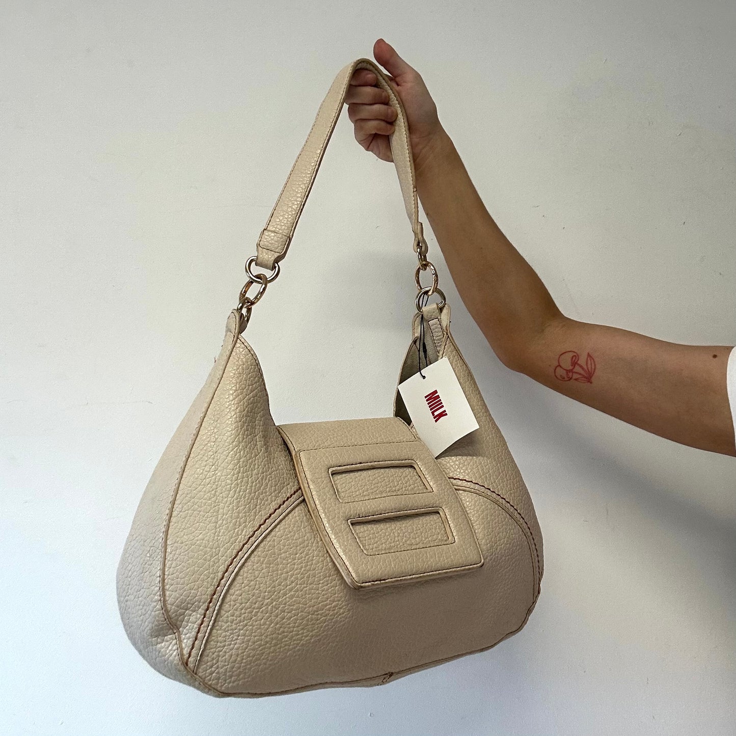 cream faux leather oversized buckle shoulder bag
