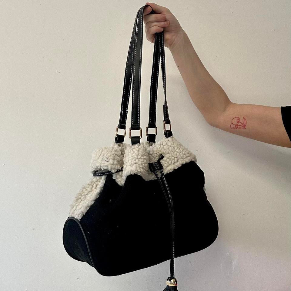 black faux fur drawstring shoulder bag