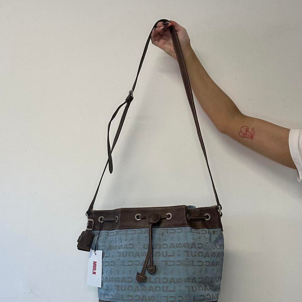 blue and brown crossbody drawstring bag