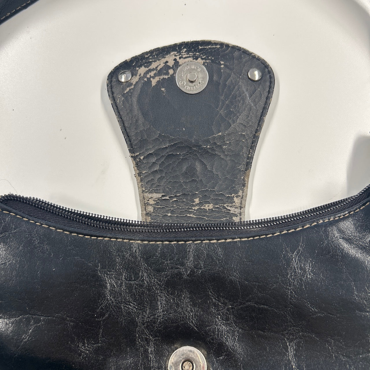 black faux leather oversized buckle shoulder bag