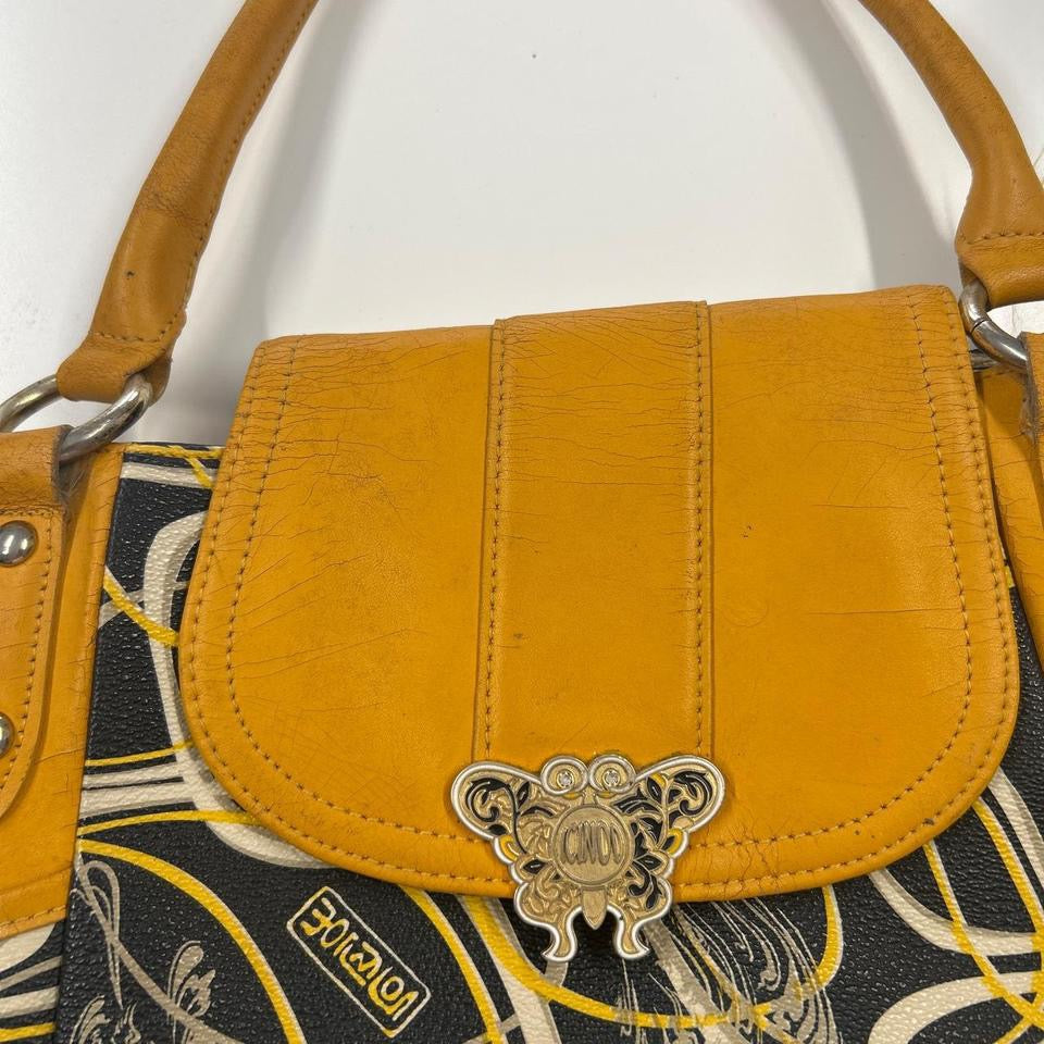 yellow and black patterned faux leather shoulder bag