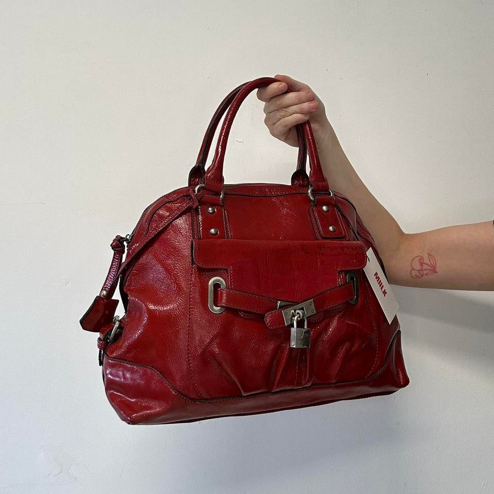 red faux leather padlock buckle shoulder bag