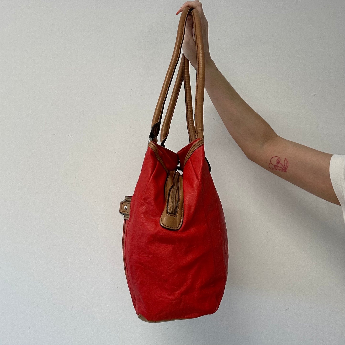 red and tanned faux leather shoulder bag