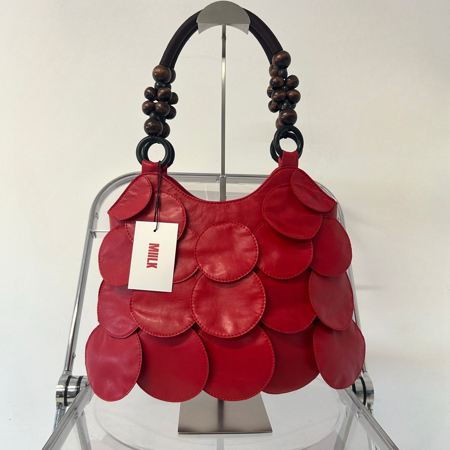 red faux leather disc beaded shoulder bag