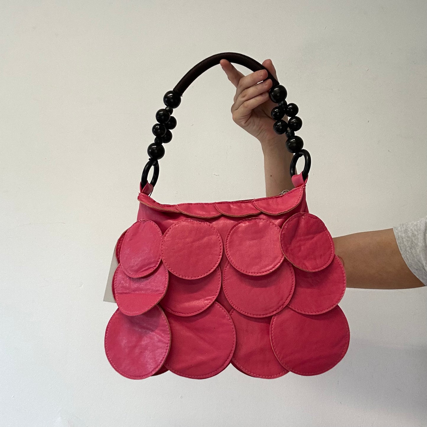 pink faux leather disc beaded shoulder bag